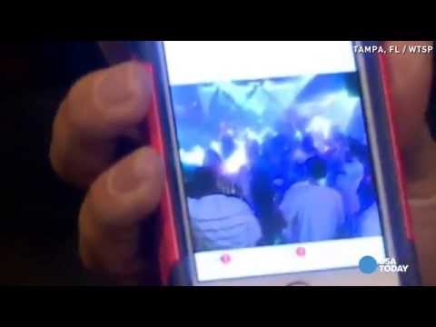 3 shot on dance floor of Tampa, Florida nightclub